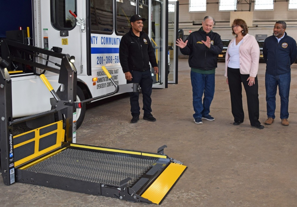 County Executive speaking with Commissioner Zur